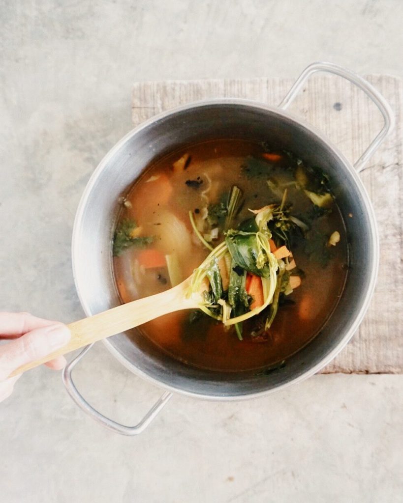 homemade vegetbale bouillon; vegetable scraps simmer