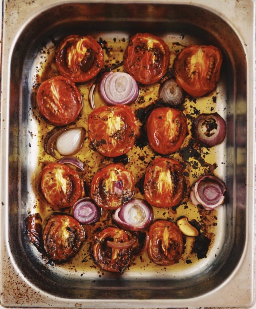 Roasted tomatoes just out of the oven. Ready to be blended into sauce