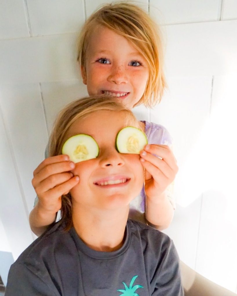 kids holding self cut veggies; one of the best ways to get kids to try more veggies