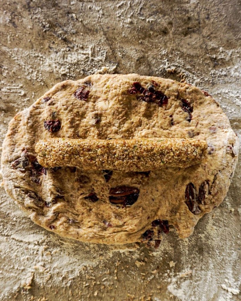 flattened dough with almond paste