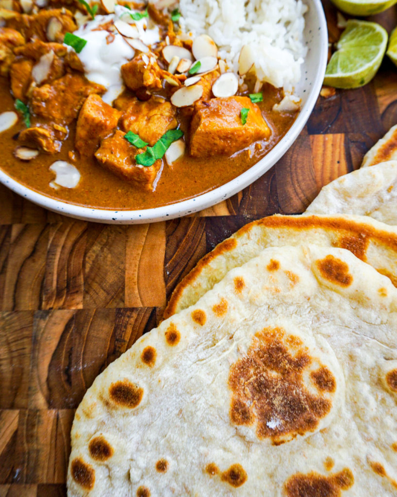 naan bread and plate of curry