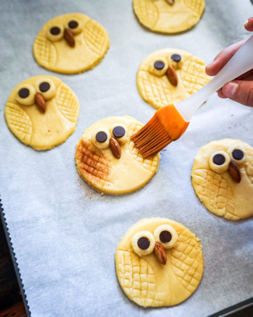 dusting cookies with cinnamon