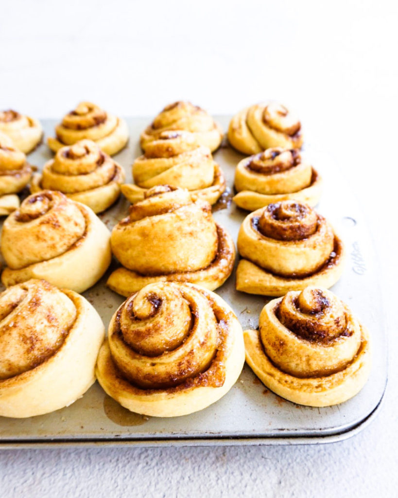 mini cinnamon rolls in muffin tin