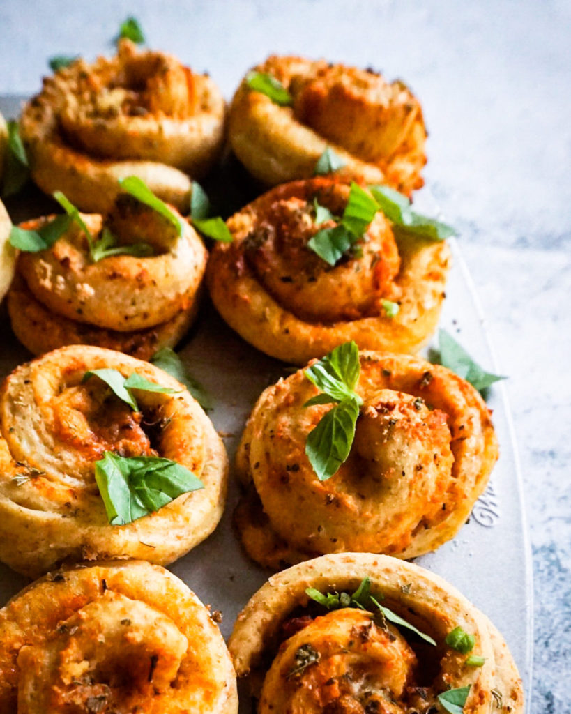 pizza buns with fresh basil close up