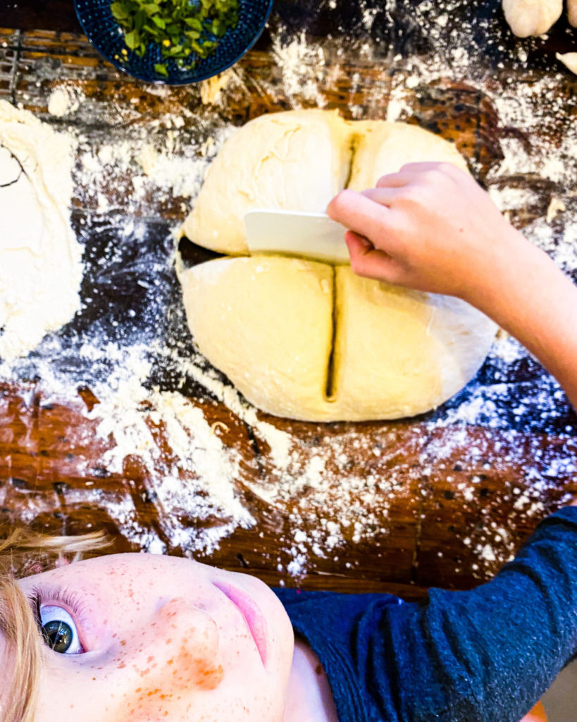 cutting the dough in 4 pieces