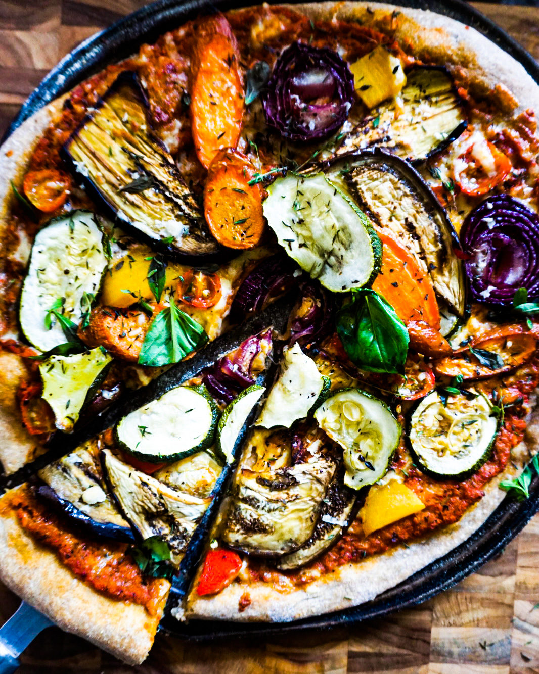 a slice of roasted veggies pizza