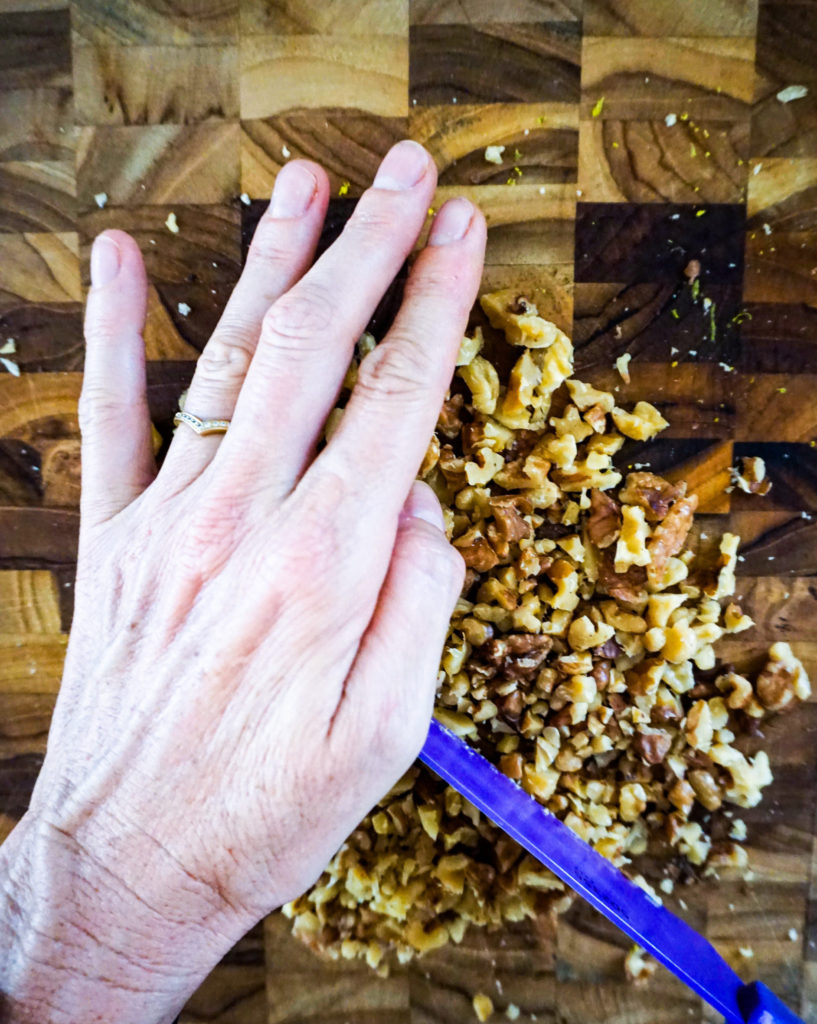 Chopping walnuts for carrot cake