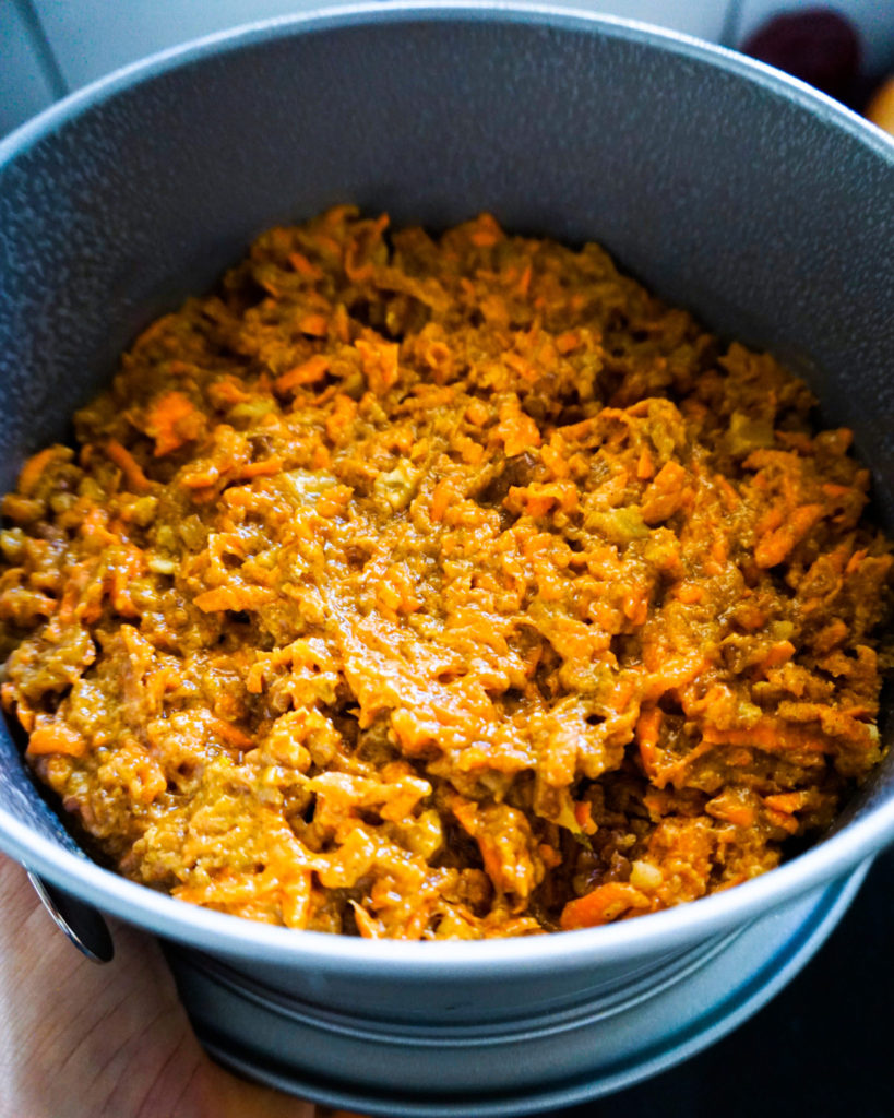 carrot cake batter in cake pan