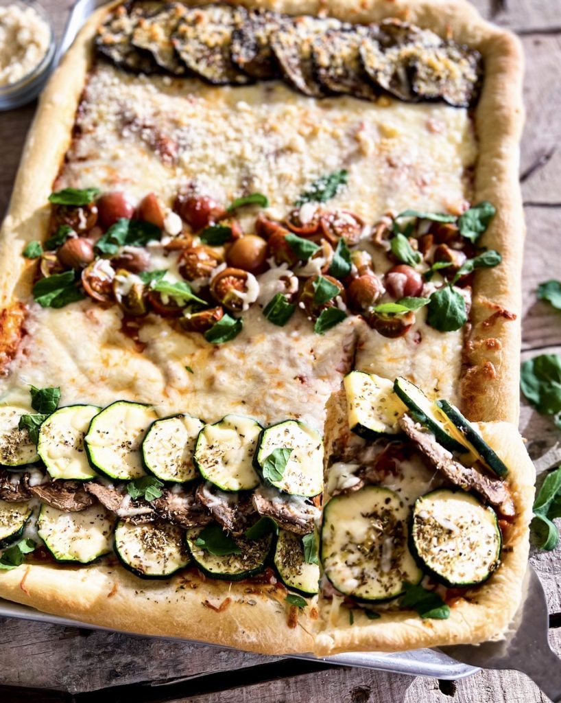 a square cut off the family sheet pan pizza