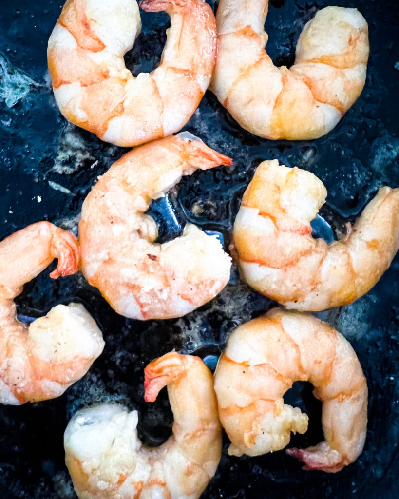 seared shrimps in a skillet