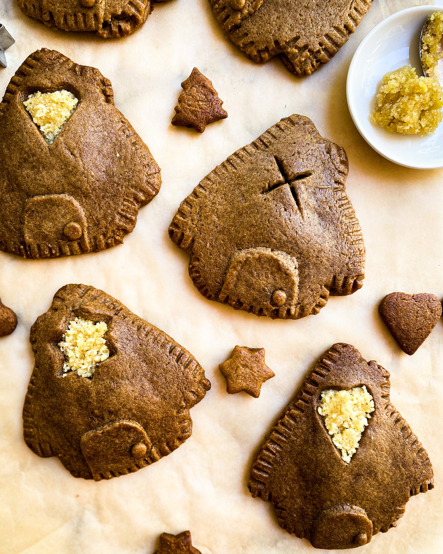 gingerbread house cookies with almond paste filling close up