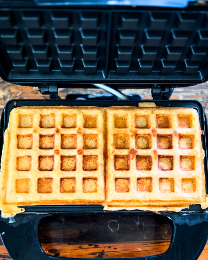 waffles ready to be taken out of the waffle maker